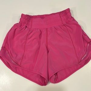 Lululemon Hotty Hot low rise shorts (4”) size zero in sonic pink color.
